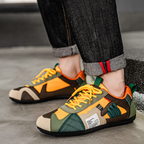 Colourblock utility trainers with layered panels and lace-up fronts