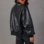 Women's bomber jacket with round collar, zip front, long sleeves and side pockets