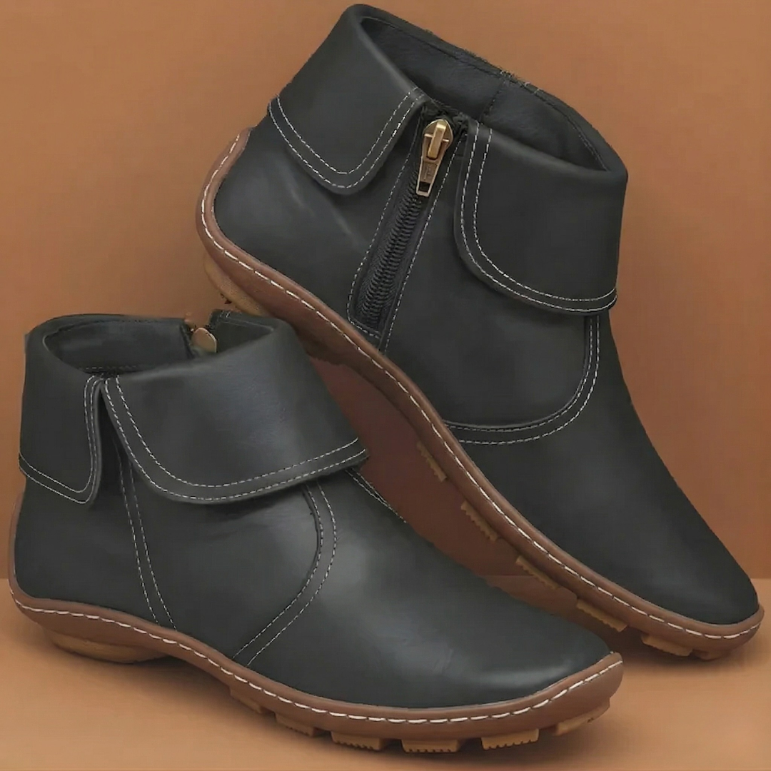 Ankle boots with foldover cuffs, side zips and textured soles