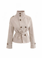 Women's beige cropped trench jacket with stand collar and tie belt