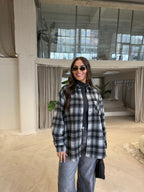 Women's black checked roll neck jumper