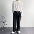 High-waist pleated straight-leg trousers with belt loops