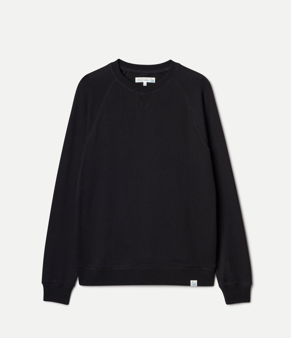 Men's black raglan crew neck sweatshirt with ribbed hem