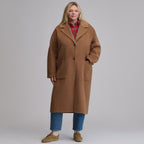 Women's camel long coat with notched lapels, front buttons and patch pockets