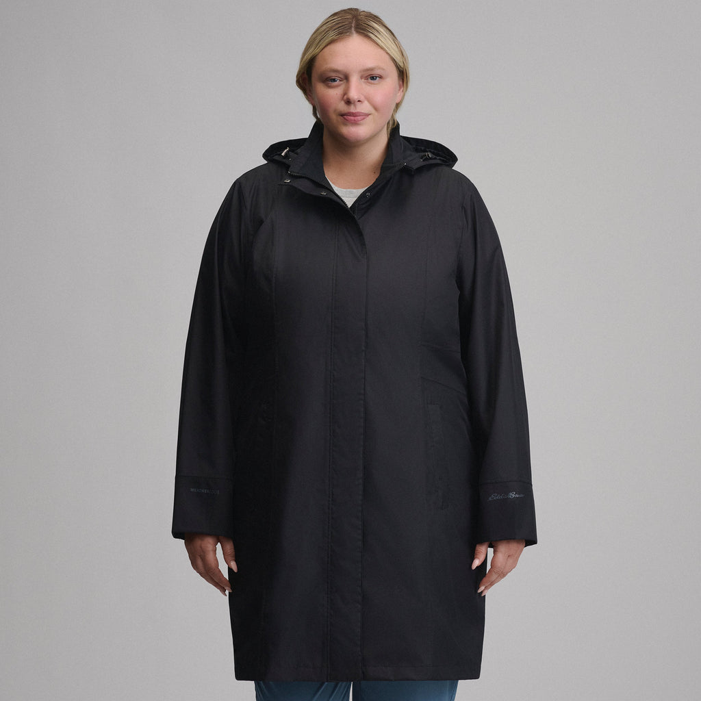 Women's hooded waterproof trench coat with long sleeves and front pockets
