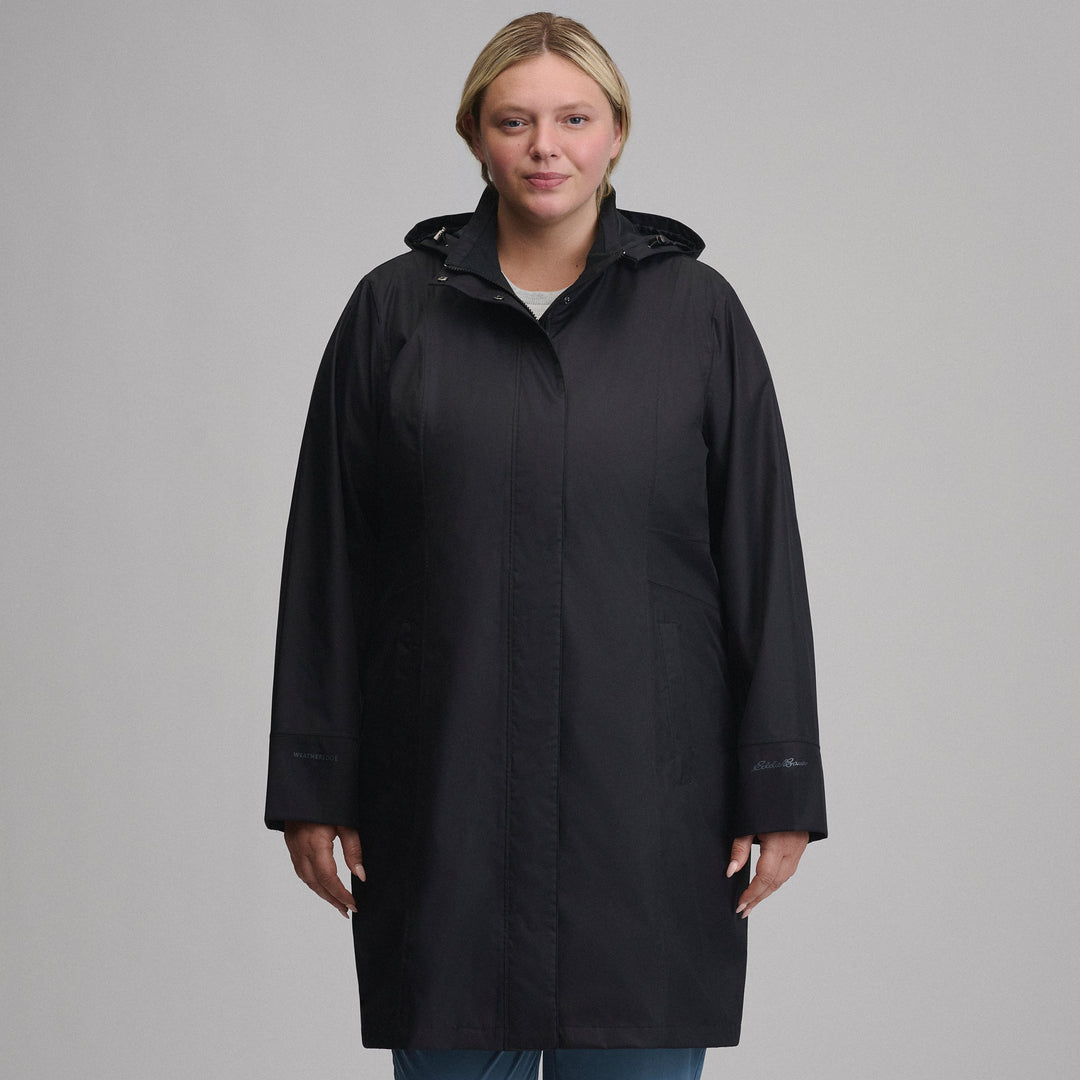 Women's hooded waterproof trench coat with long sleeves and front pockets