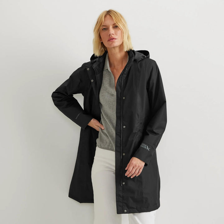 Women's hooded waterproof trench coat with long sleeves and front pockets