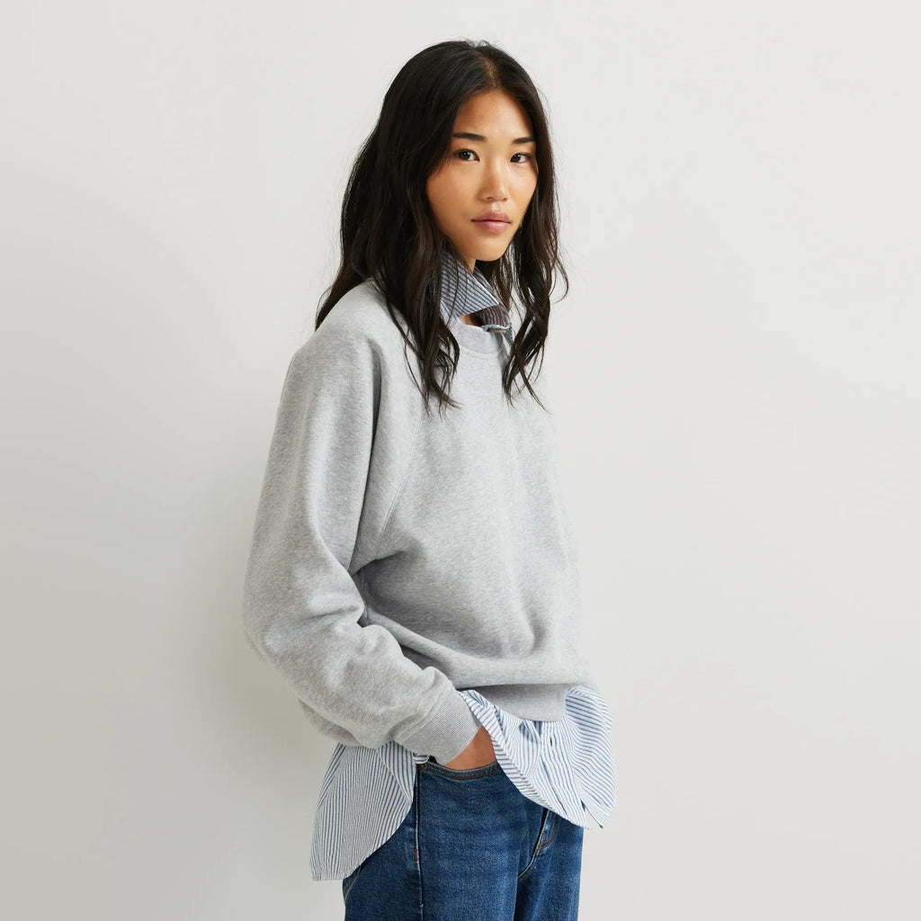 Women's crew neck sweatshirt with long raglan sleeves and ribbed trims