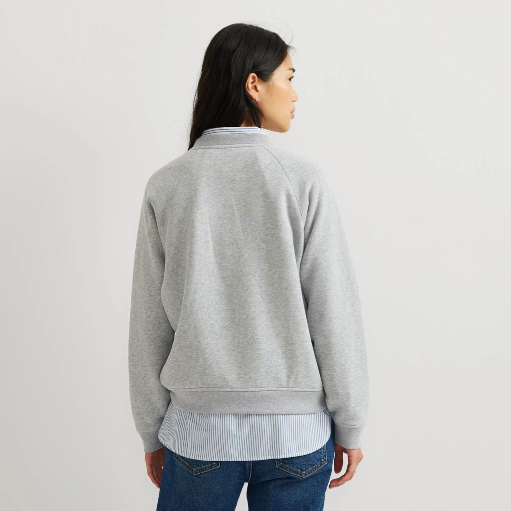 Women's crew neck sweatshirt with long raglan sleeves and ribbed trims