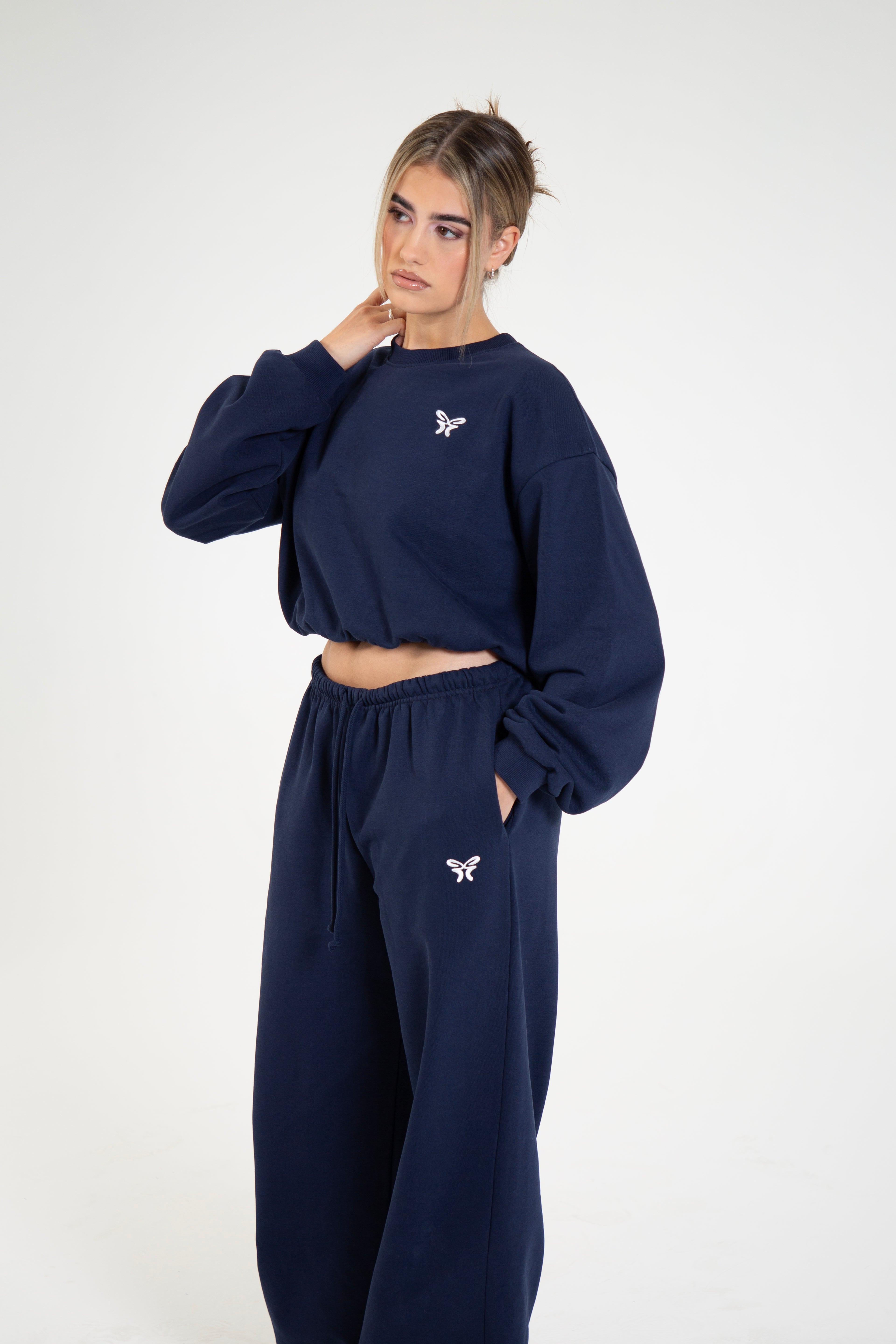 Women's navy cropped crew neck sweatshirt with long sleeves