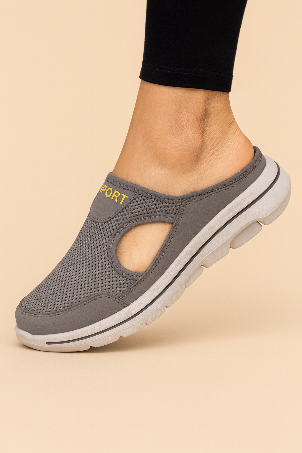 Women's slip-on trainers with textured panels, side cut-outs and a thick ridged sole