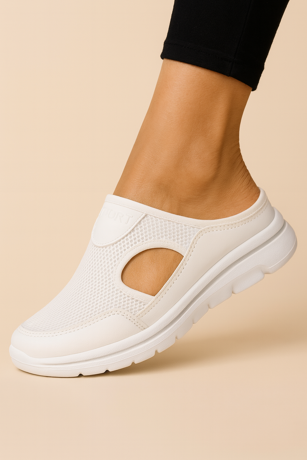 Women's slip-on trainers with textured panels, side cut-outs and a thick ridged sole