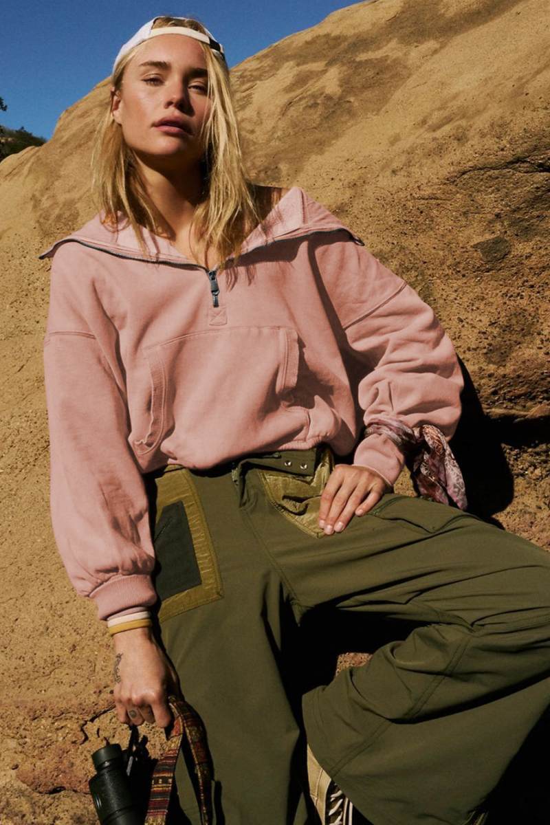 Women's pink hooded half-zip lightweight jacket with kangaroo pocket