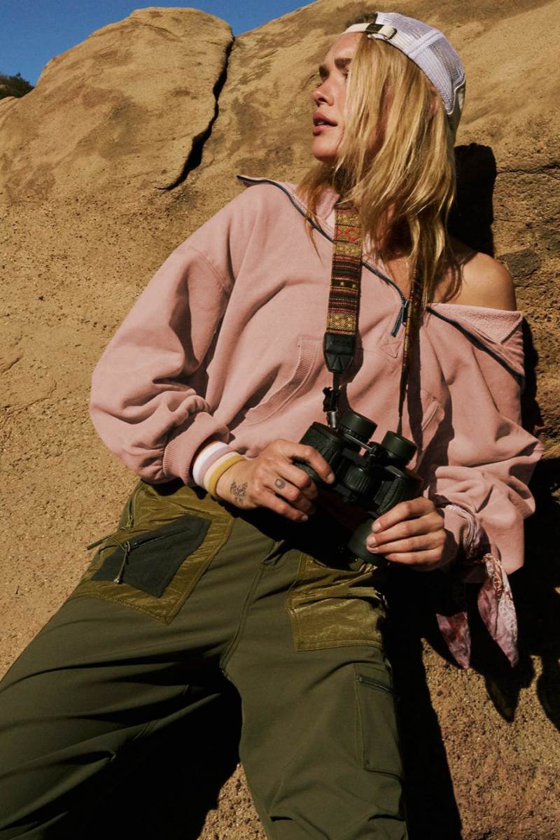 Women's pink hooded half-zip lightweight jacket with kangaroo pocket
