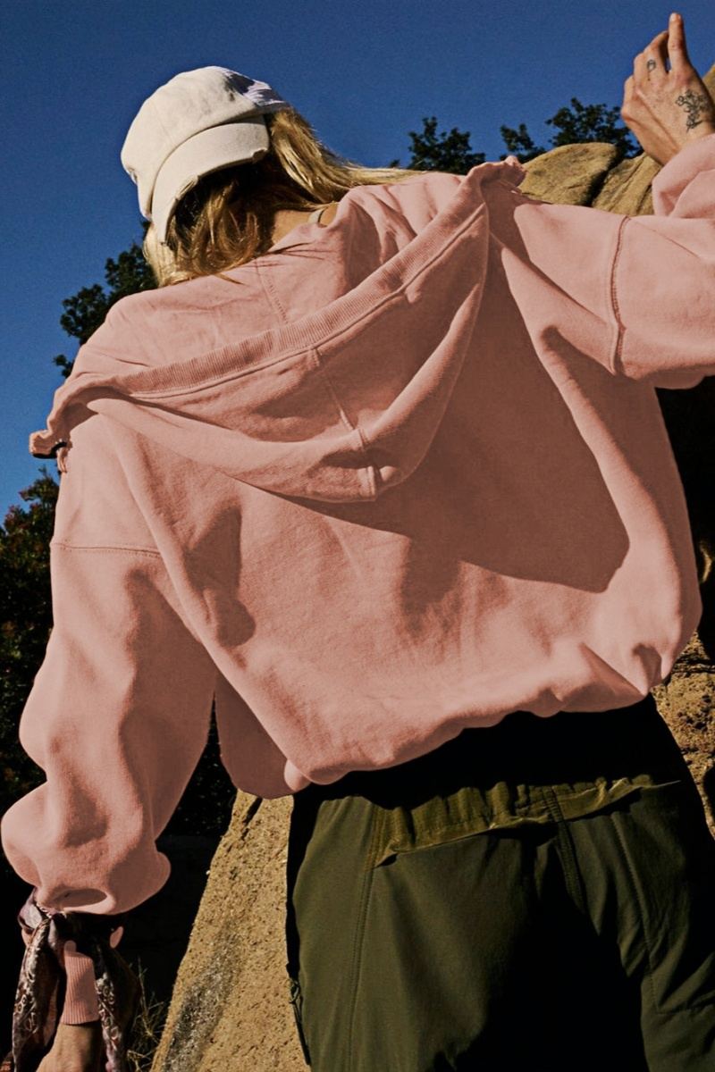 Women's pink hooded half-zip lightweight jacket with kangaroo pocket