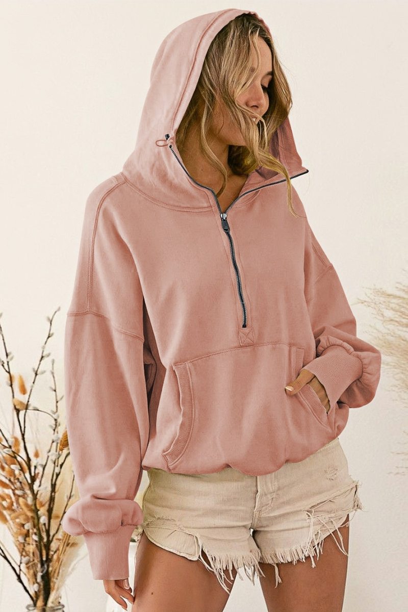 Women's pink hooded half-zip lightweight jacket with kangaroo pocket