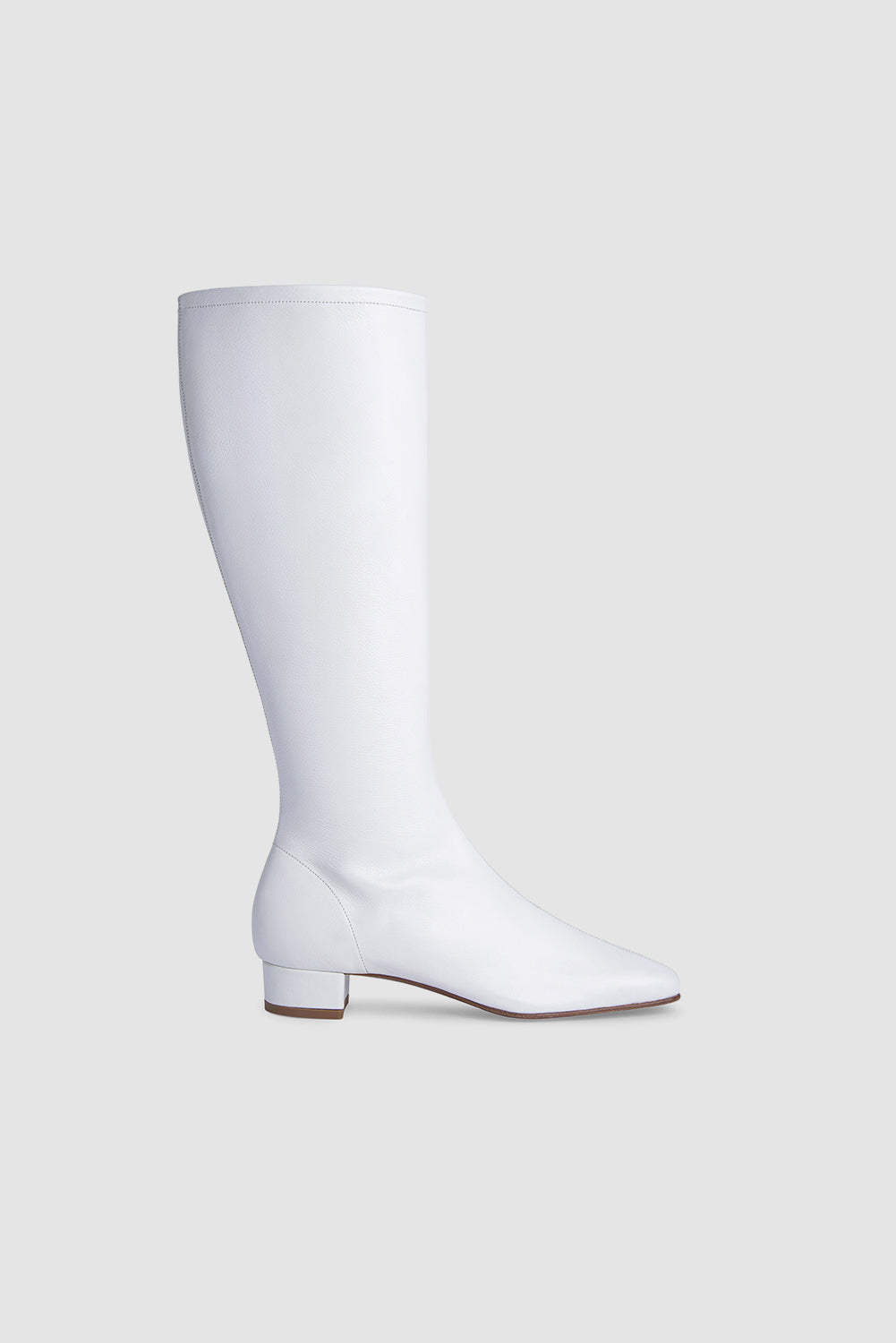 White women's knee-high boots with square toes and low heels