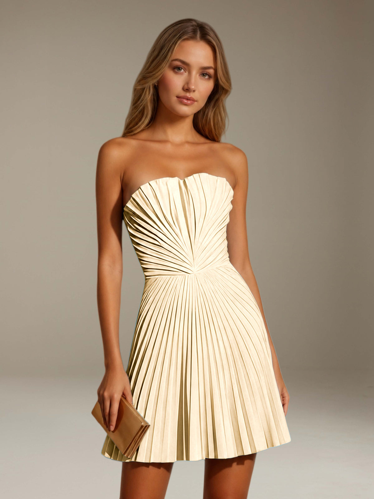 Women's strapless pleated A-line mini dress with a fitted bodice and flared skirt