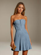 Women's strapless pleated A-line mini dress with a fitted bodice and flared skirt