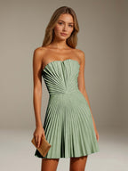 Women's strapless pleated A-line mini dress with a fitted bodice and flared skirt