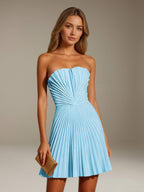 Women's strapless pleated A-line mini dress with a fitted bodice and flared skirt
