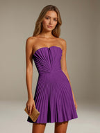 Women's strapless pleated A-line mini dress with a fitted bodice and flared skirt