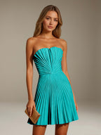 Women's strapless pleated A-line mini dress with a fitted bodice and flared skirt