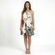 Women's floral halter mini dress with an open back and botanical print