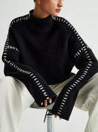 Women's crew neck knit sweater with contrast stitch sleeve details