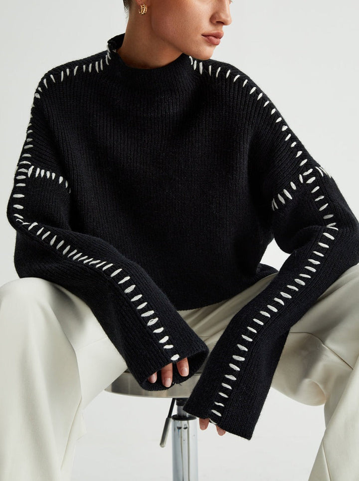 Women's crew neck knit sweater with contrast stitch sleeve details