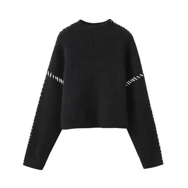 Women's crew neck knit sweater with contrast stitch sleeve details