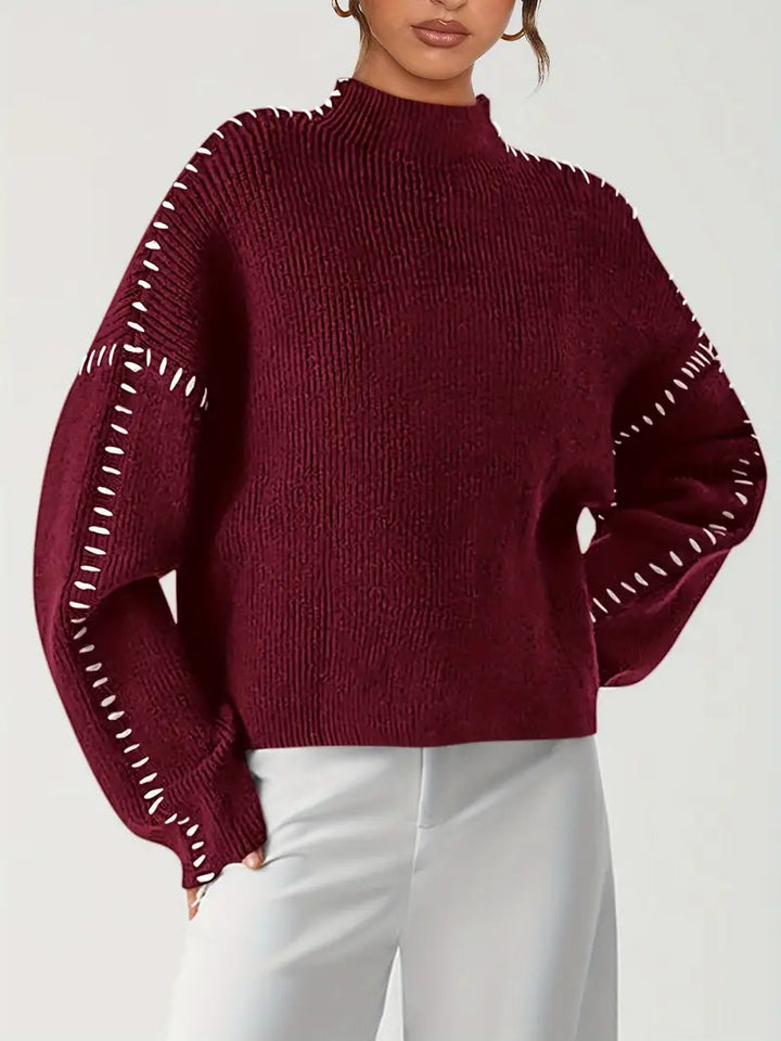 Women's crew neck knit sweater with contrast stitch sleeve details