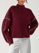 Women's crew neck knit sweater with contrast stitch sleeve details