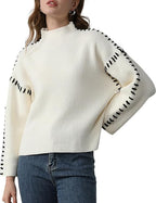 Women's crew neck knit sweater with contrast stitch sleeve details