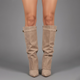 Women's over-the-knee boots with pointed toes, low heels, side zips and buckle strap details