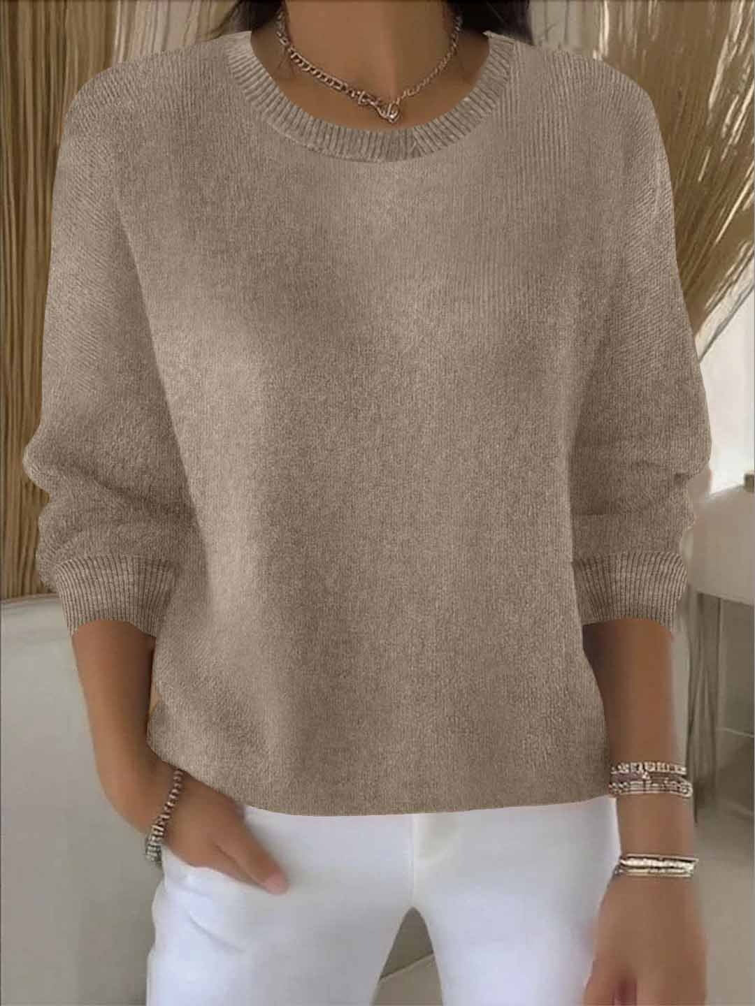 Women's crew neck knitted sweater with long sleeves and ribbed trims