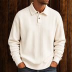 Men's textured polo sweater with collared neckline, buttons and long sleeves