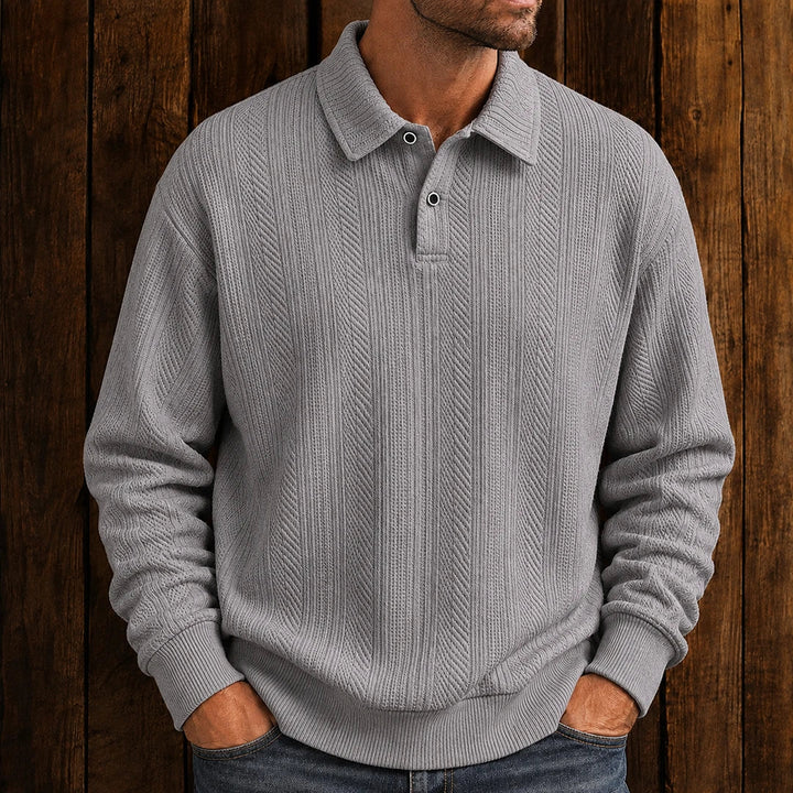 Men's textured polo sweater with collared neckline, buttons and long sleeves