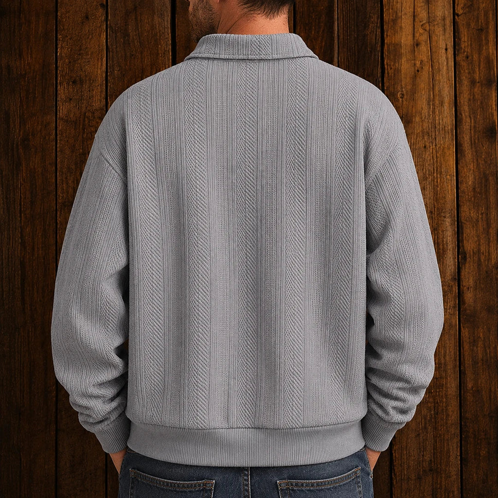 Men's textured polo sweater with collared neckline, buttons and long sleeves