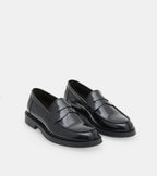 Men's black polished penny loafers with rounded toes and low block heels