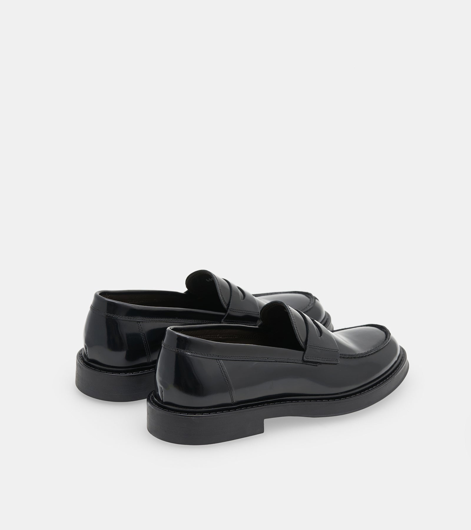 Men's black polished penny loafers with rounded toes and low block heels