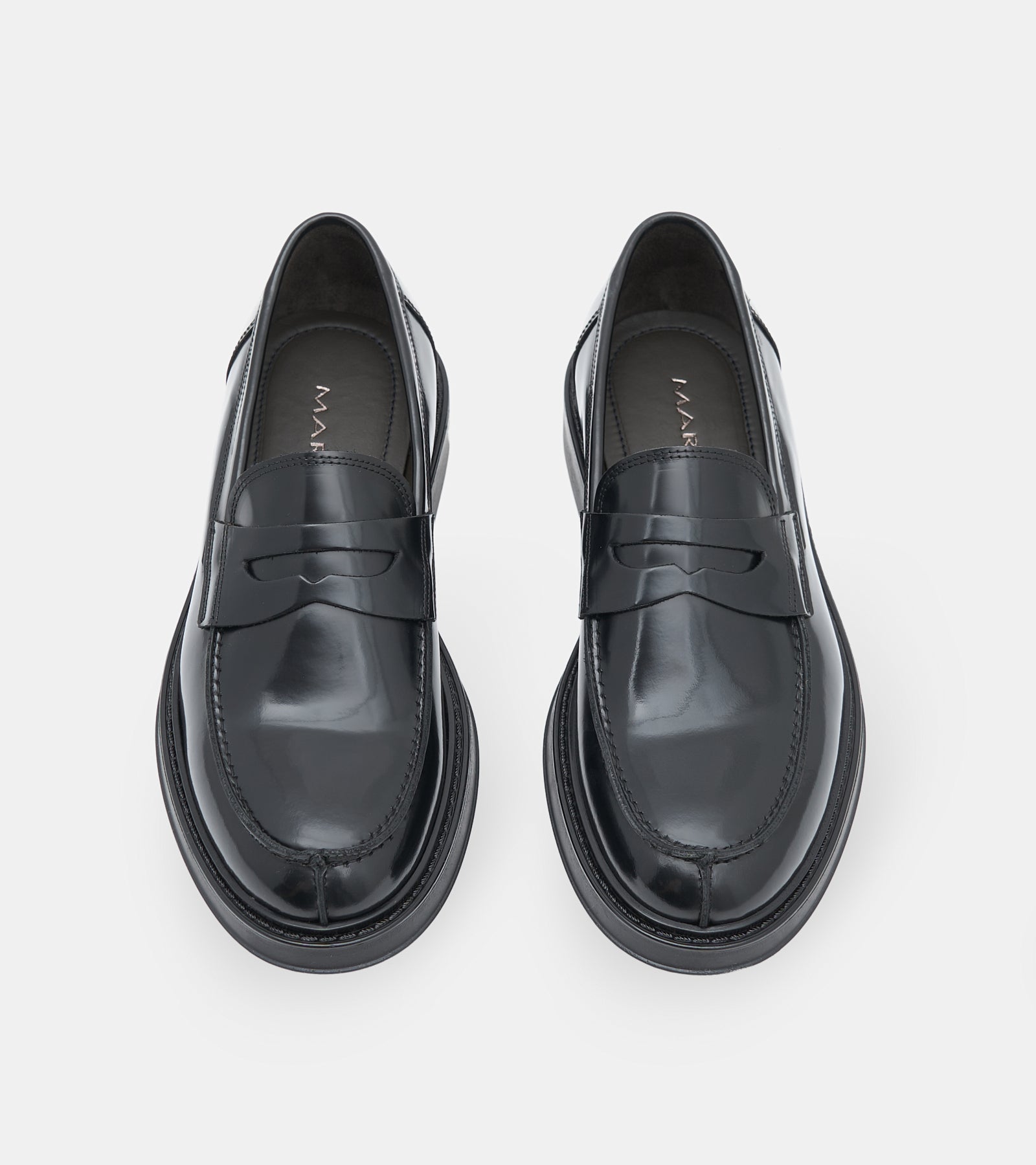 Men's black polished penny loafers with rounded toes and low block heels