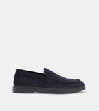 Men's navy slip-on loafers with almond toes and flat soles