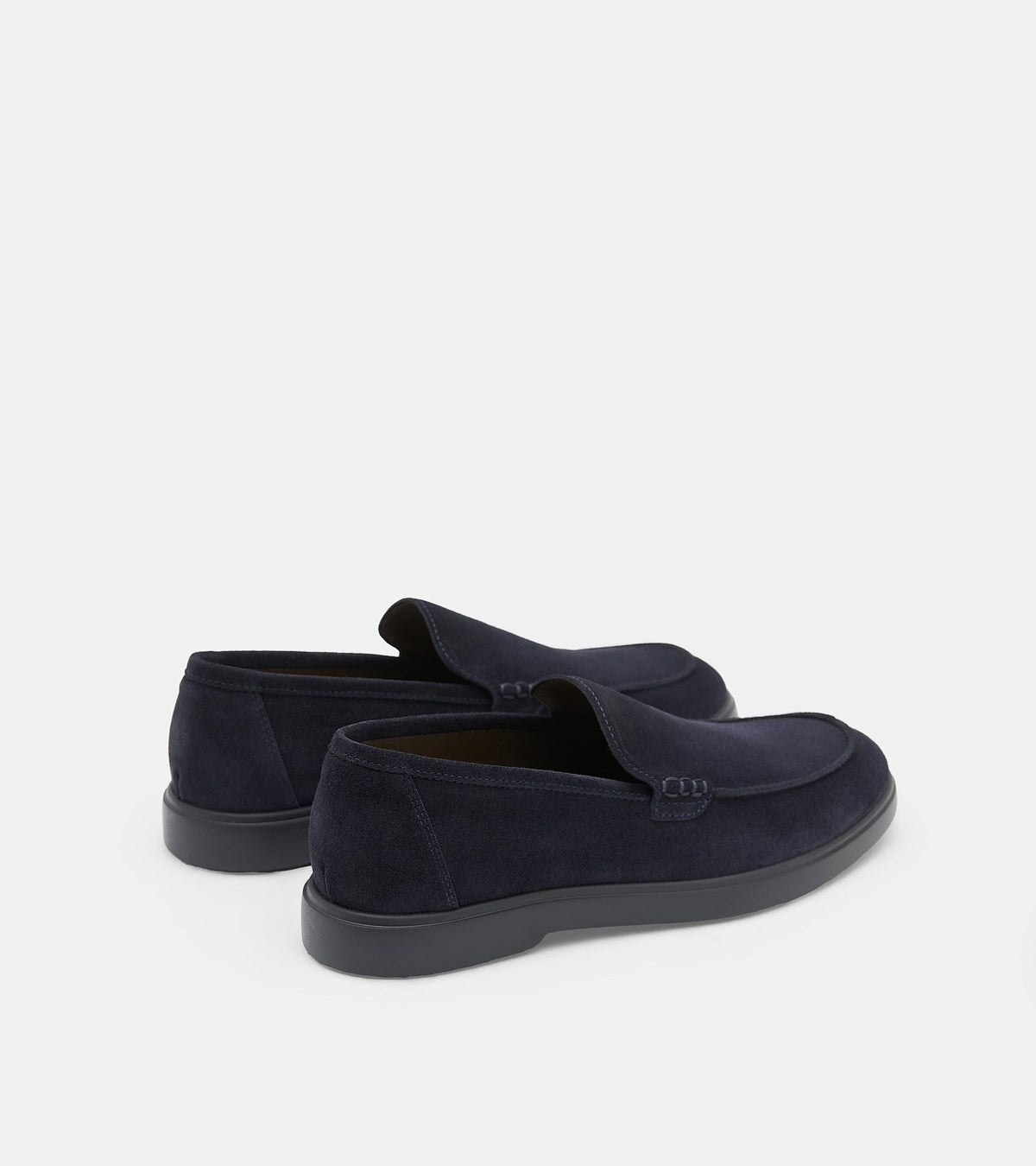 Men's navy slip-on loafers with almond toes and flat soles