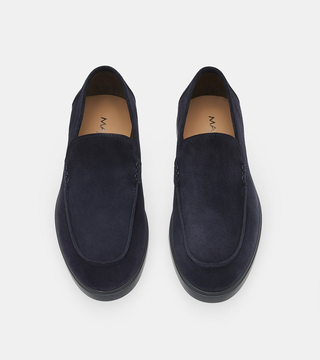 Men's navy slip-on loafers with almond toes and flat soles