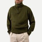 Men's olive green ribbed half-zip jumper with a high collar and long sleeves