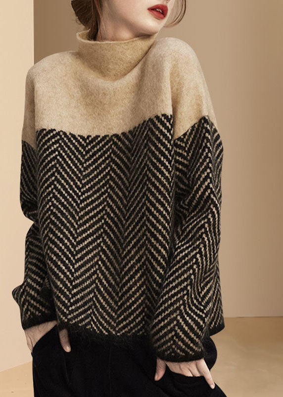 Women's turtle neck jumper with geometric chevron pattern and long sleeves