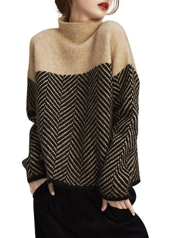 Women's turtle neck jumper with geometric chevron pattern and long sleeves