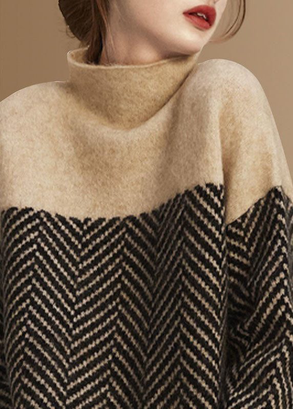 Women's turtle neck jumper with geometric chevron pattern and long sleeves