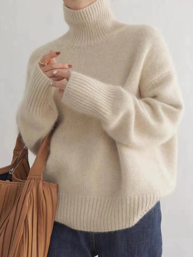Women's cream turtleneck sweater with ribbed trims